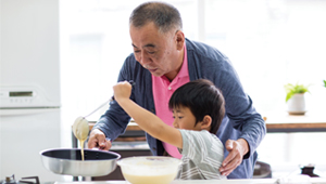 adult and child cooking 