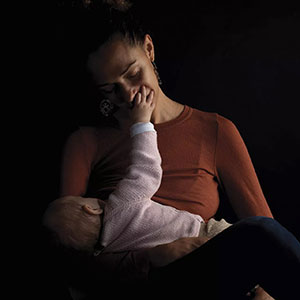 Mother playing with her baby