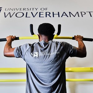 Student doing pullup
