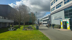 Exterior of Walsall Campus showing buildings and a green area