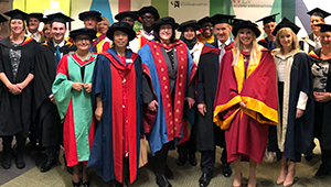 A group of staff from the Business School at graduation