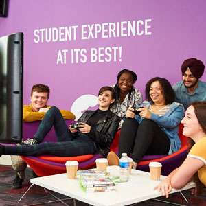 image of group of students playing video game having fun