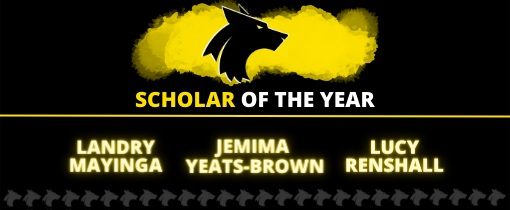 Students huddled together on an outdoor pitch at Walsall Campus, all wearing sports uniforms