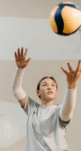 Boxing rings prepared in the University sports hall, overseen by rows of seats