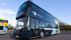 A dark blue double decker bus with University of Wolverhampton branding