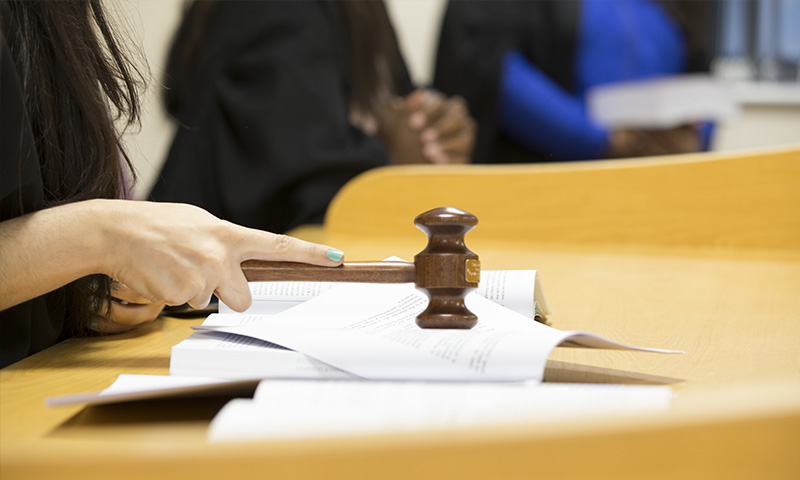 Gavel  banging on court room table